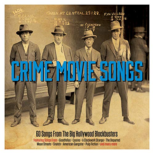 Four men in suits and fedoras stand before a vintage police mugshot backdrop.