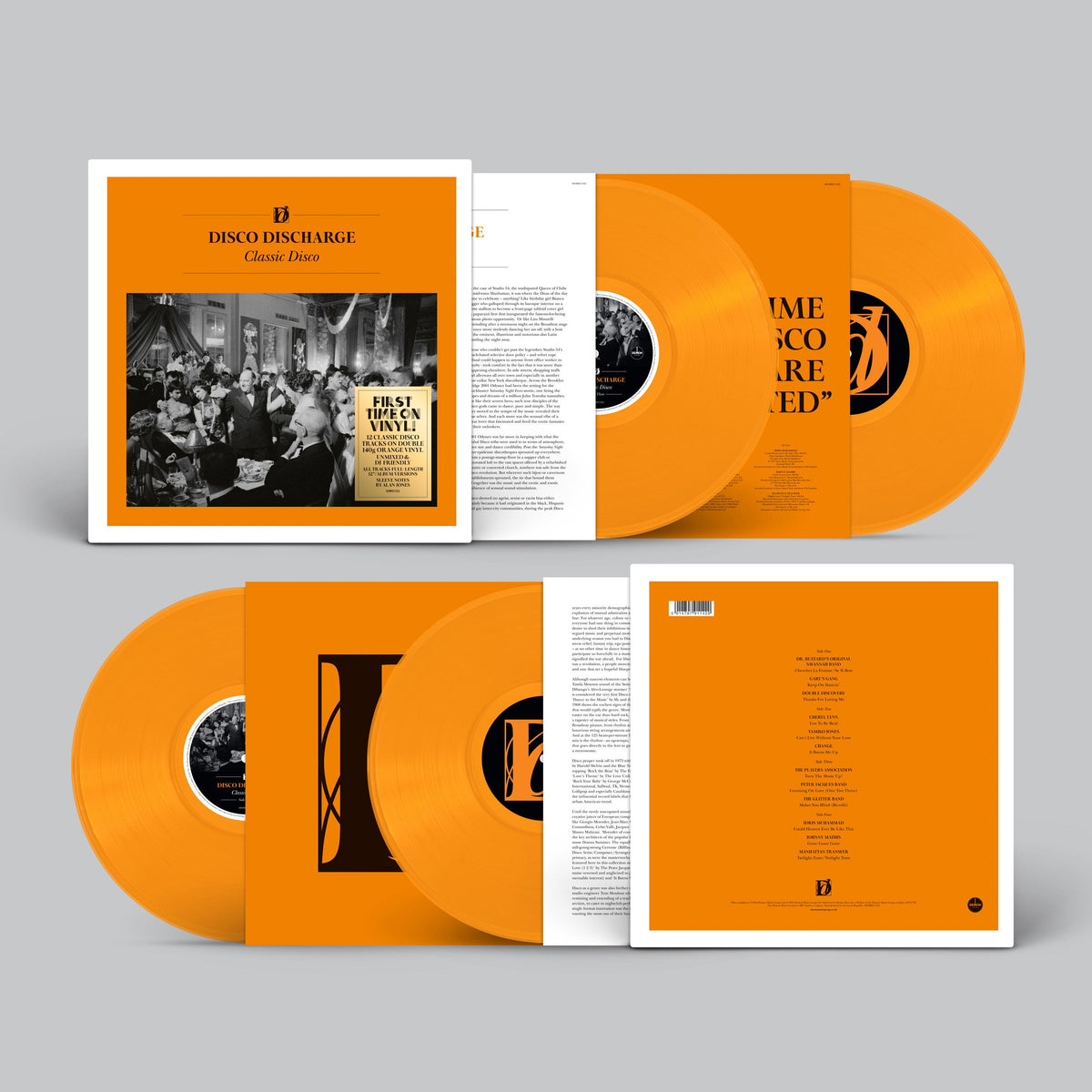 Two orange vinyl records with cover art featuring a group photo.