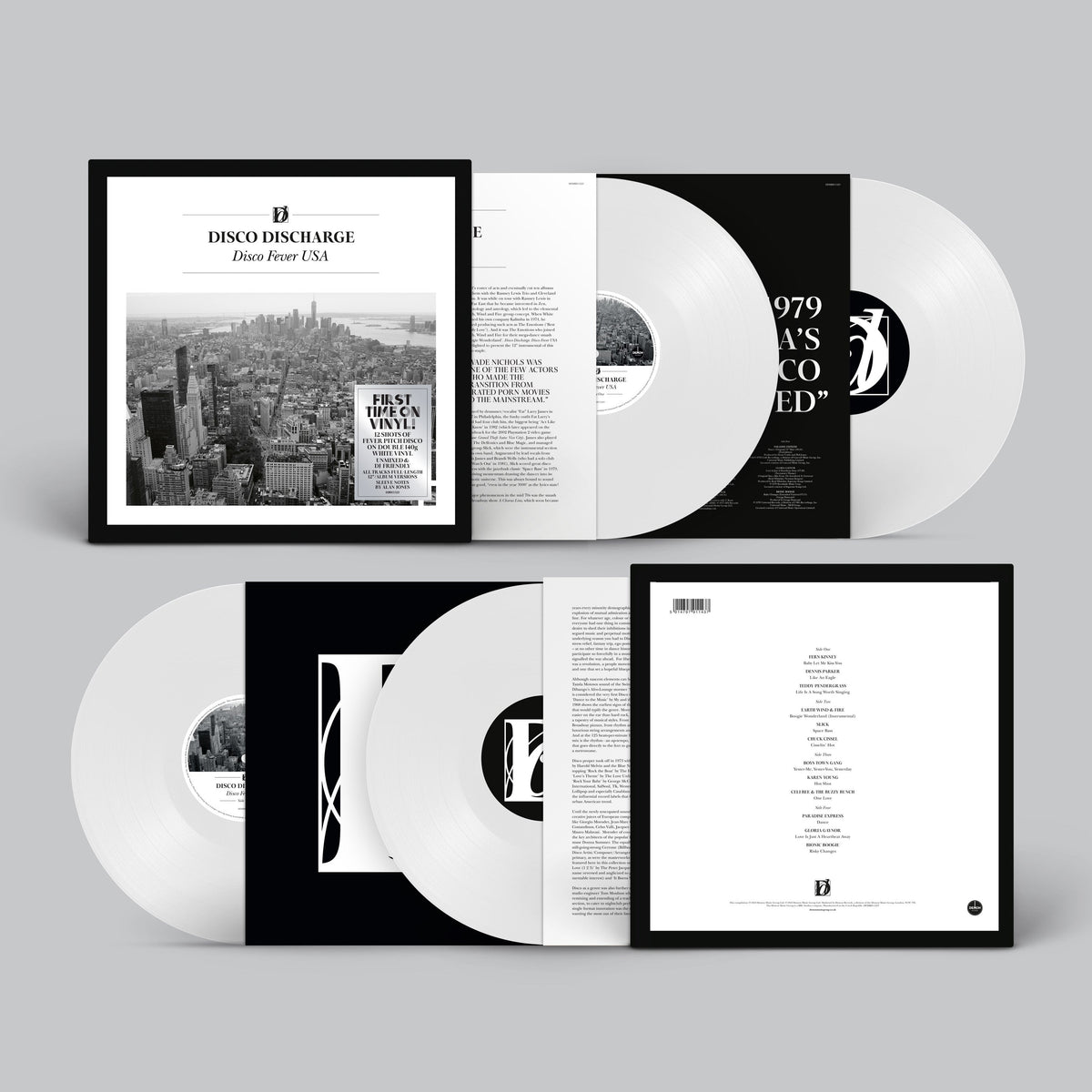 “Disco Discharge” vinyl record with white discs and black cover art.