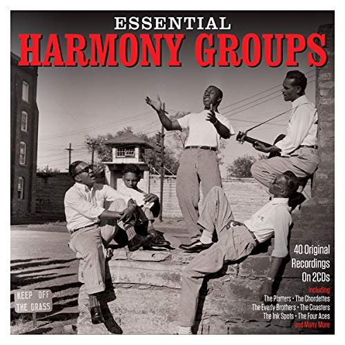 Black and white photo of a vocal group singing outdoors with album title text.