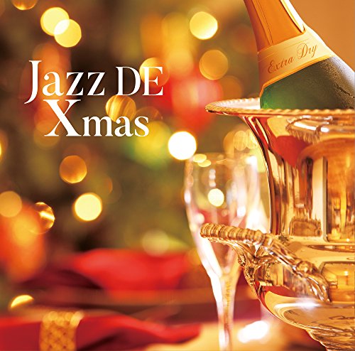 A champagne bottle in a silver bucket against a blurred, festive, bokeh-lit background.