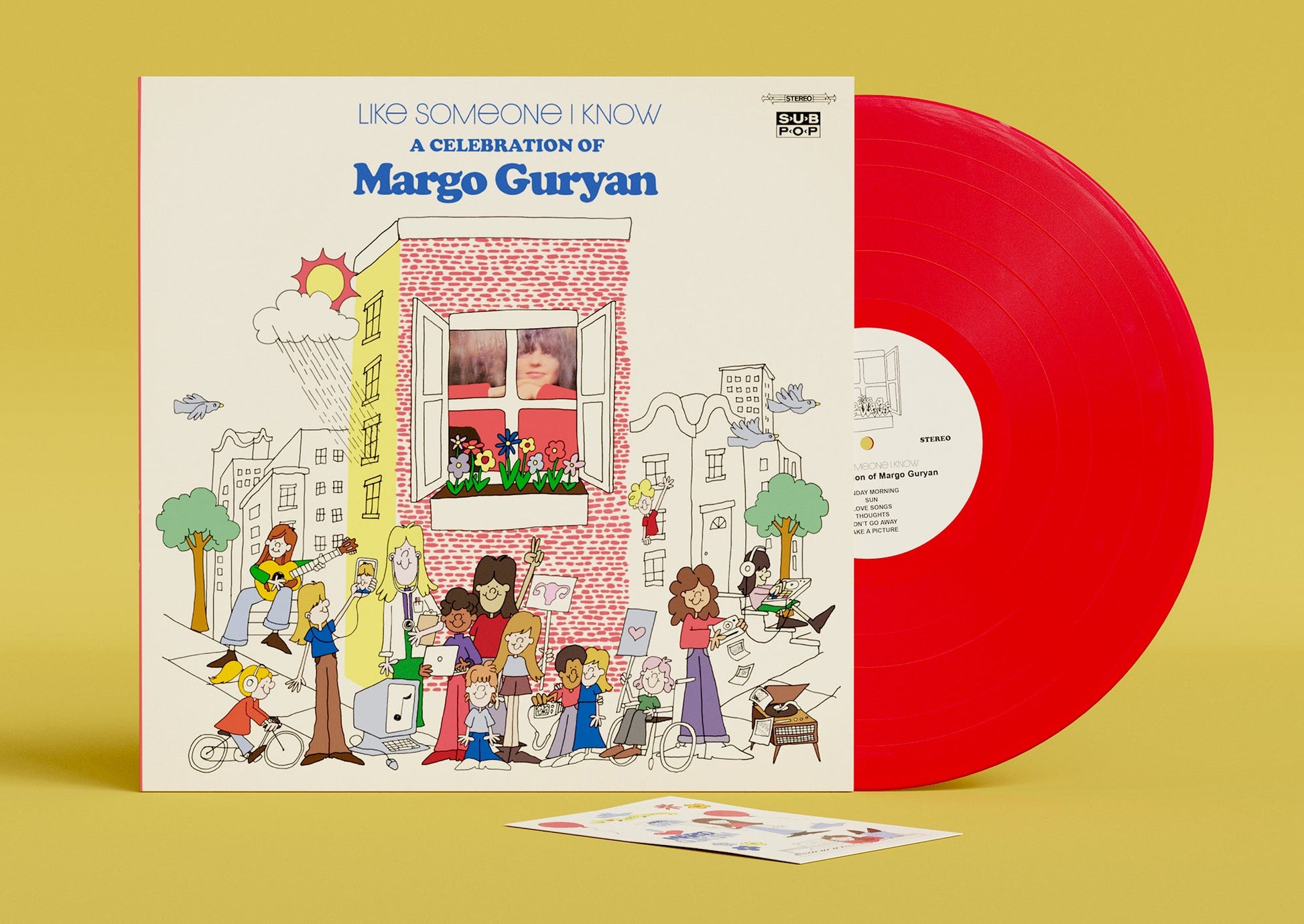 Vinyl record cover with illustrated buildings and a red record beside it.
