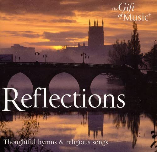 CD cover with stone bridge, church tower, and sunset reflection.