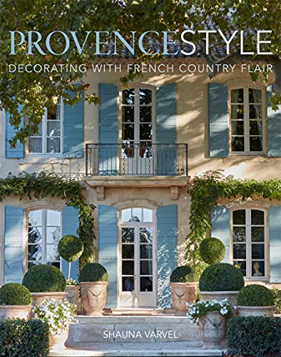 Book cover featuring a blue shuttered French country house with greenery.