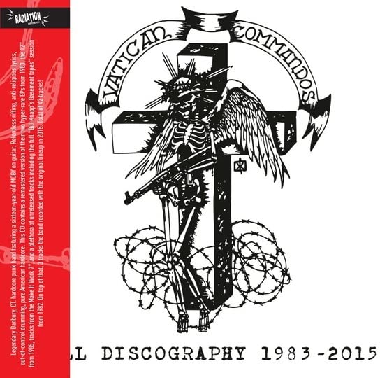 CD cover: black and white skeletal angel with a machine gun on a cross.