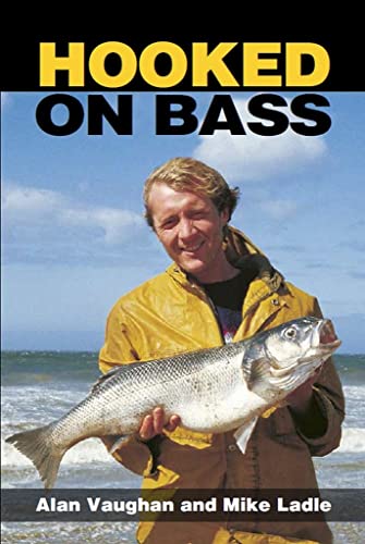 Book cover: man holding a large fish against a seascape.