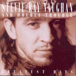 CD cover featuring Stevie Ray Vaughan in a cowboy hat.