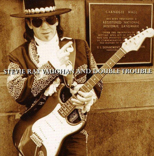 CD cover for Stevie Ray Vaughan’s “Live from Carnegie Hall” with photos of Vaughan.