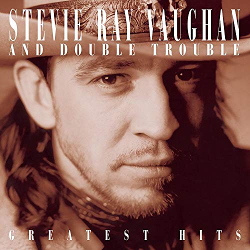 CD cover featuring Stevie Ray Vaughan in a cowboy hat, sepia tone.