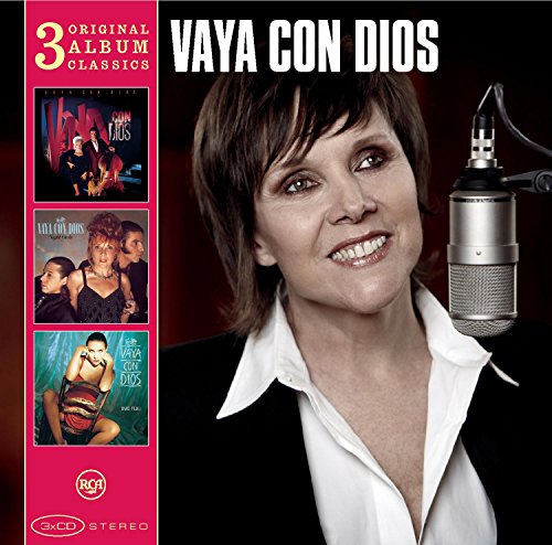 Vaya Con Dios album cover featuring a woman with a microphone.