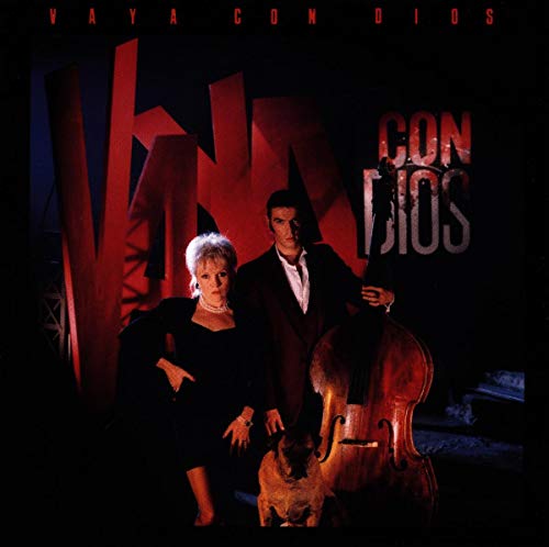 CD cover for Vaya Con Dios featuring a couple and a dog with a bass.