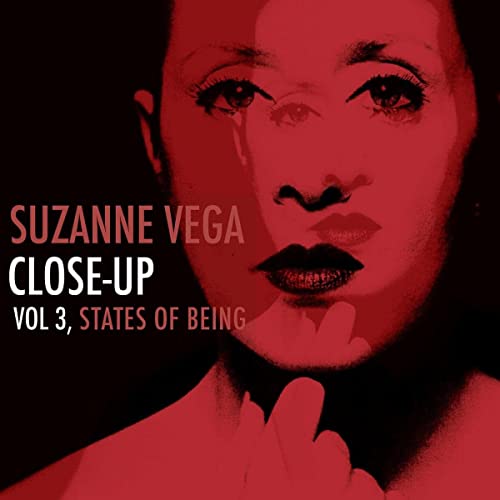 Red-toned portrait of Suzanne Vega, album cover for "States Of Being.