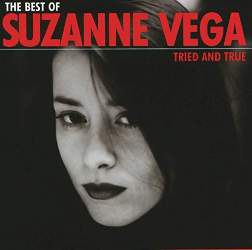 Close-up portrait of Suzanne Vega on a CD cover, black and white.