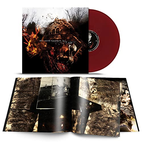 Vein.fm vinyl record with a dark, fiery album cover and an open lyric booklet.