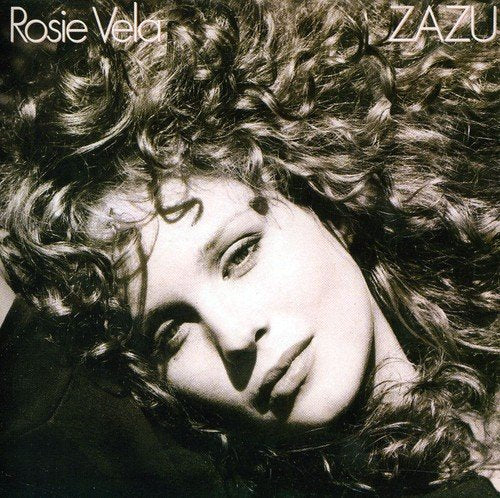 A black and white album cover featuring a woman with curly hair.