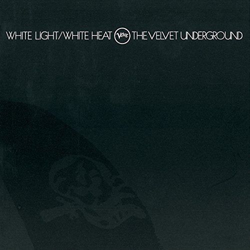 The image is a darkened album cover for the Velvet Underground's "White Light/White Heat" with a faint image of a banana and a skull. The title and artist are written in white text at the top of the image.