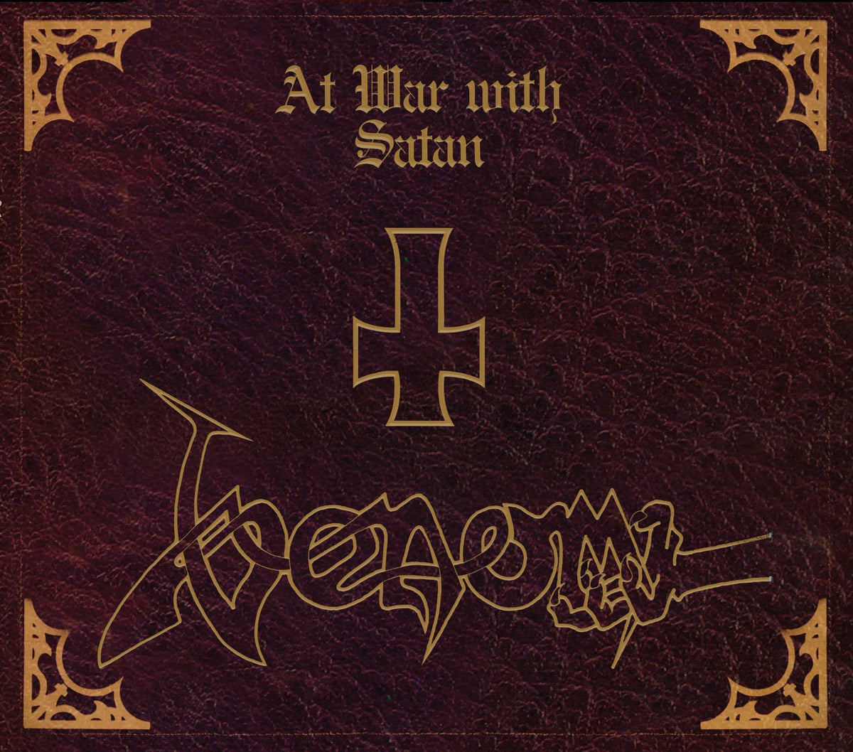 Venom album cover: dark red, cross, band logo, ornate corners.