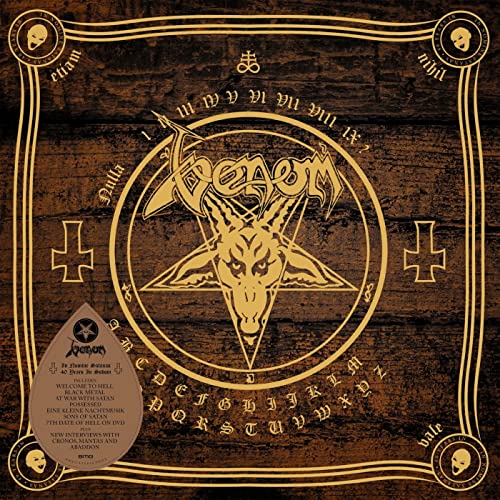 Venom In Nomine Satanas album cover featuring a goat head pentagram on wooden background.