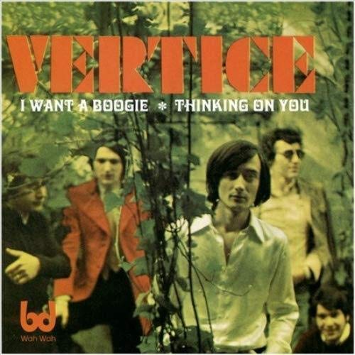 Vinyl record cover with band photo amidst green foliage and red text.