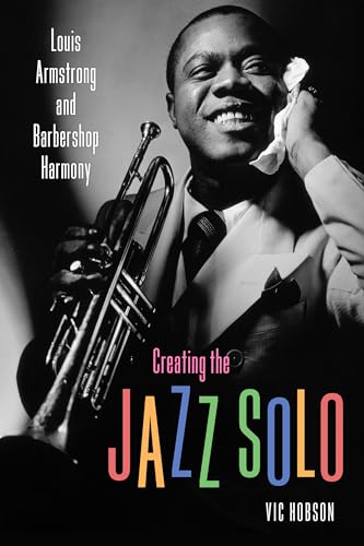 Black and white portrait of Louis Armstrong with his trumpet.