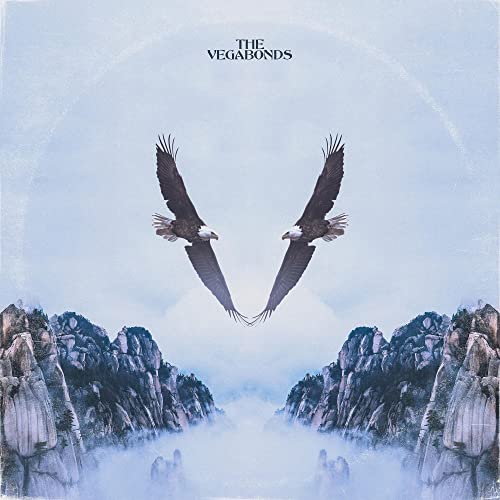 Album cover with two eagles facing each other over misty mountains.