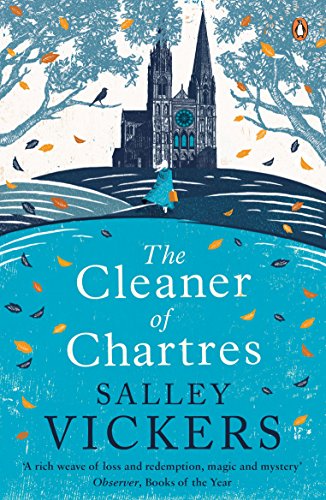 Book cover showing a person walking toward Chartres Cathedral amidst falling autumn leaves.