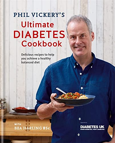 Cookbook cover featuring chef Phil Vickery holding a plate of food.