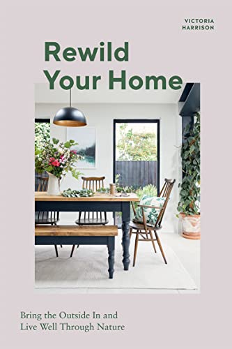Book cover: "Rewild Your Home" with a dining room scene featuring plants.