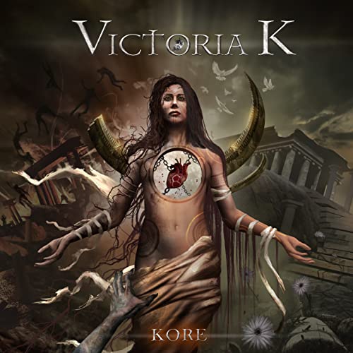 Victoria K album cover: woman with heart imagery, ruins, and birds.