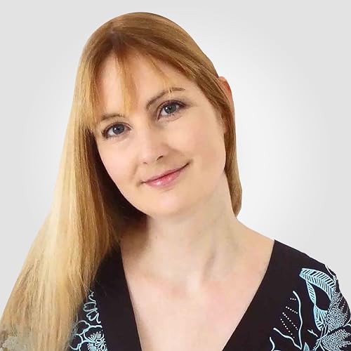 A portrait of a woman with long blonde hair wearing a black patterned top.