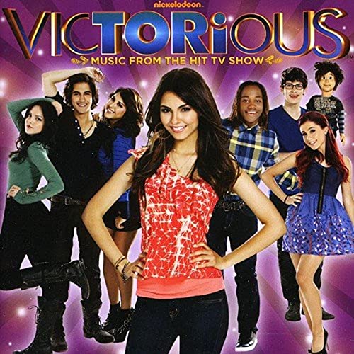 The Victorious cast poses together against a purple background on the album cover.
