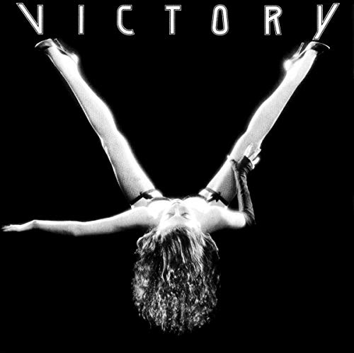 Black and white album cover featuring a person in a dynamic pose.