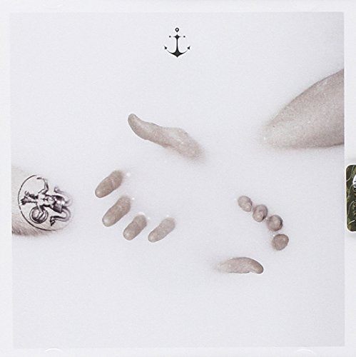 CD cover: white liquid with small, pebble-like shapes and an anchor.