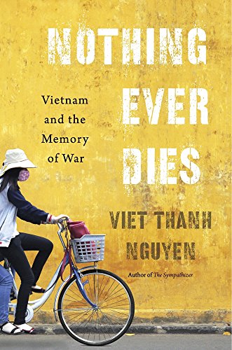 Book cover: "Nothing Ever Dies" with a cyclist in front of a yellow wall.