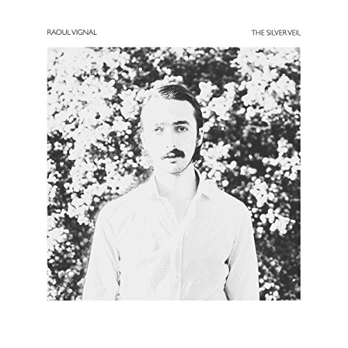 Album cover with man in white shirt against a floral background in black and white.