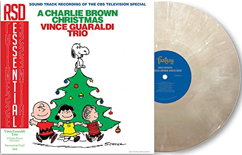 A Charlie Brown Christmas" vinyl record cover featuring Snoopy and friends.