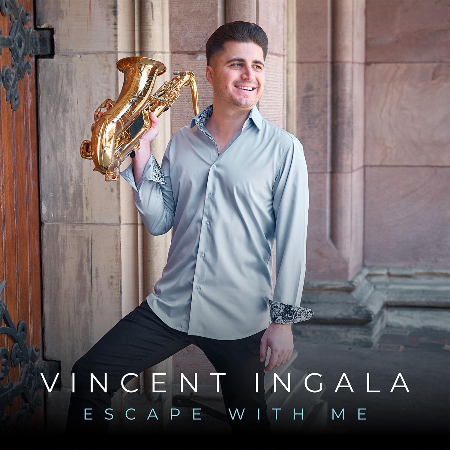 Man with saxophone smiles, album cover for "Vincent Ingala - Escape with Me".
