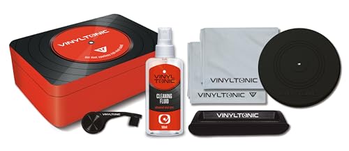Red tin containing vinyl record cleaning kit with fluid and brush.