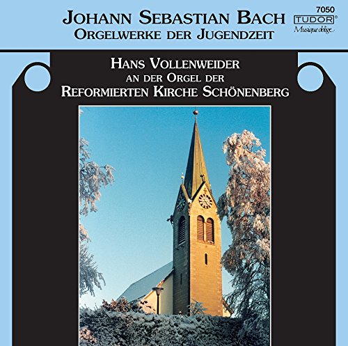 CD cover featuring a snow-covered church with a tall spire.