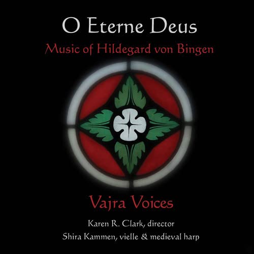 CD cover: black background with red and green stained-glass design.