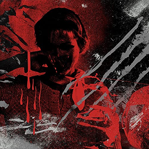 Red and black album cover featuring a distorted face and paint splatters.