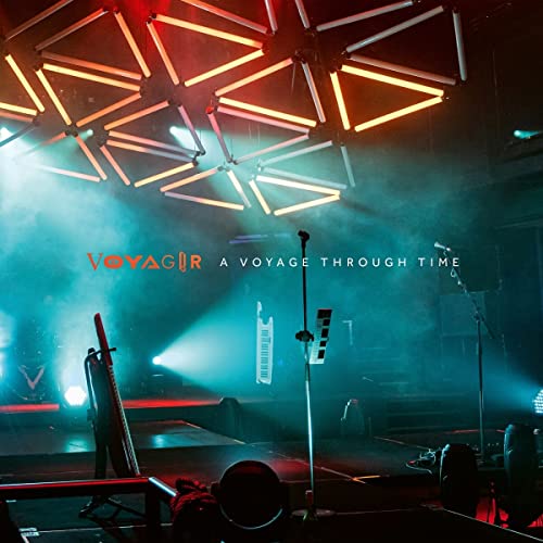 Album cover for “Voyager - A Voyage Through Time” with stage lights.
