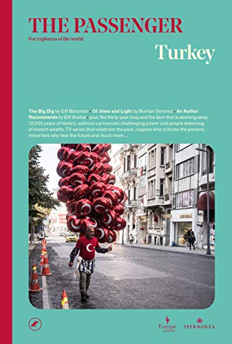 Book cover showing a man carrying a large bunch of red Turkish flag balloons.