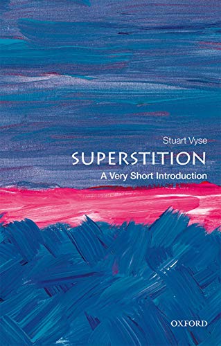 Book cover with abstract blue and pink brushstrokes, titled "Superstition.