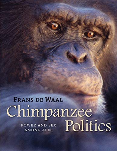 Close-up of a chimpanzee face on the cover of a book.