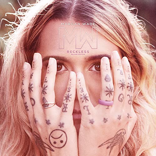 Album cover for Morgan Wade’s “Reckless: Deluxe Edition” featuring tattooed hands.
