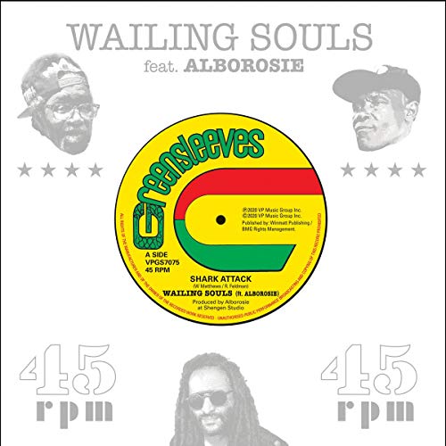 A vinyl record cover featuring a yellow label with red and green accents.
