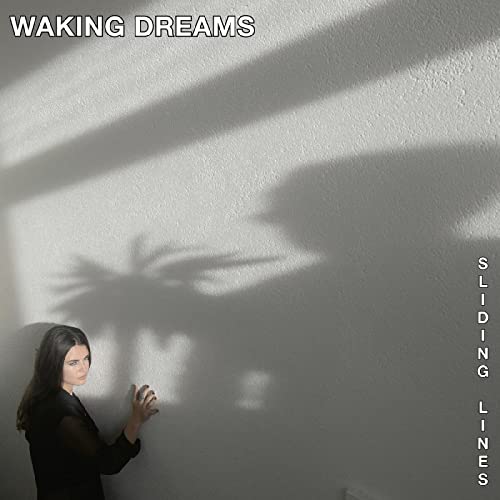 Album cover: woman with shadow face, text “Waking Dreams - Sliding Lines.”