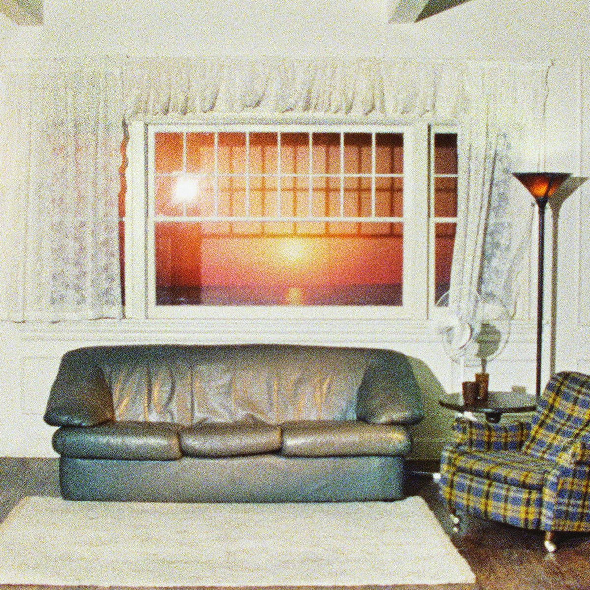 Cassette album cover for Wallows’ “Model” featuring a living room scene.