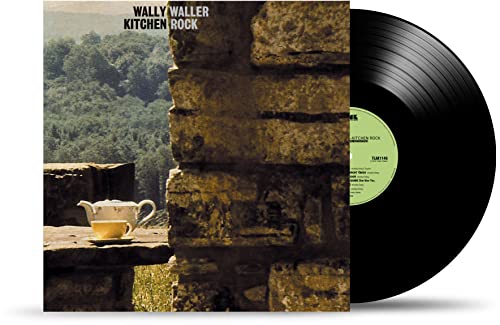 Kitchen Rock" vinyl record with album cover showing stone wall and teacup.